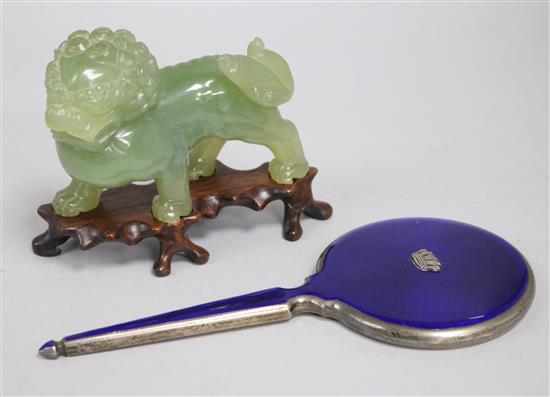 A hardstone Chinese lion and enamel mirror
